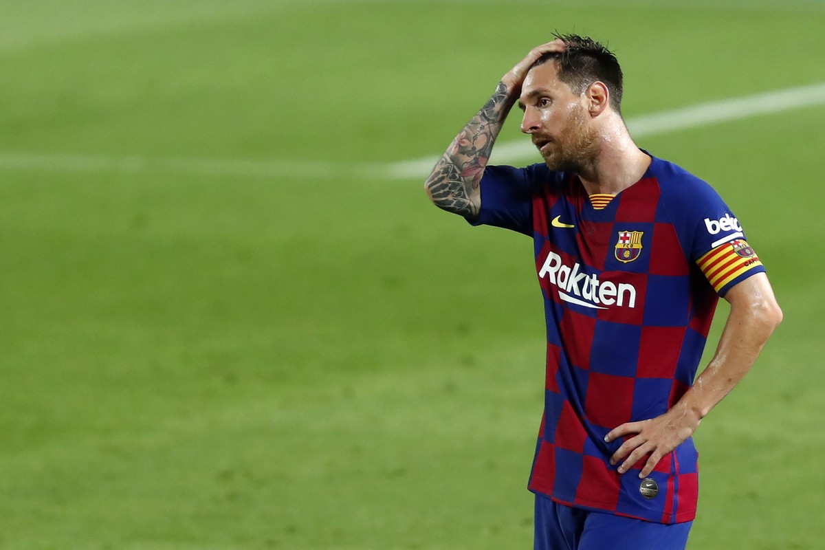 Barcelona's Lionel Messi reacts after the end of a Spanish La Liga soccer match between Barcelona and Osasuna at the Camp Nou stadium in Barcelona, Spain, Thursday, July 16, 2020. (AP Photo/Joan  ...