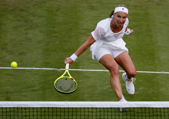 epa06066409 Svetlana Kuznetsova of Russia in action against Ons Jabeur of Tunisia during their first round match for the Wimbledon Championships at the All England Lawn Tennis Club, in London, Britain ...