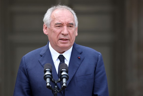 epa12367127 France's outgoing Prime Minister Francois Bayrou delivers remarks during the handover ceremony at the Hotel Matignon in Paris, France, 10 September 2025. The Elysee Palace announced o ...