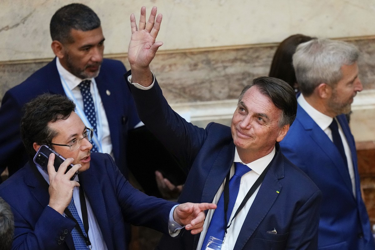 Former Brazilian President Jair Bolsonaro waves during the swearing-in ceremony for new Argentina's President Javier Milei at Congress in Buenos Aires, Argentina, Sunday, Dec. 10, 2023. (AP Photo ...