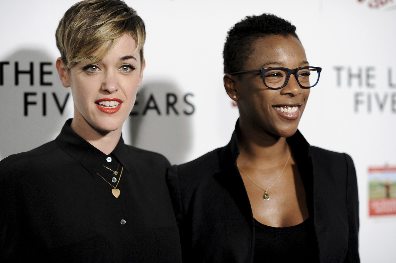 FILE - In this Feb. 11, 2015, file photo, Lauren Morelli, left, and Samira Wiley arrive at the LA Premiere of &quot;The Last Five Years&quot; in Los Angeles. Wiley, who plays the character Poussey Was ...