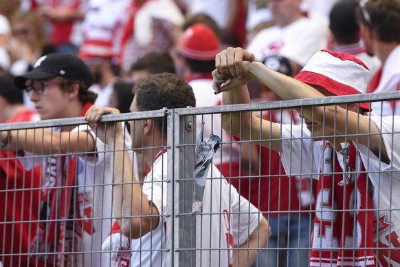 Supporters of FC Sion show dejection during the Swiss Cup final soccer match between FC Basel 1893 and FC Sion at the stade de Geneve stadium, in Geneva, Switzerland, Thursday, May 25, 2017. (KEYSTONE ...