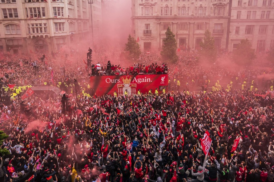Crowds greet the Liverpool soccer team during their Premier League winners parade in Liverpool, England, Monday, May 26, 2025. (Owen Humphreys/PA via AP)
Britain Soccer Premier League