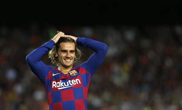 FC Barcelona&#039;s Antoine Griezmann reacts after missing an opportunity during the Joan Gamper trophy soccer match between FC Barcelona and Arsenal at the Camp Nou stadium in Barcelona, Spain, Sunda ...