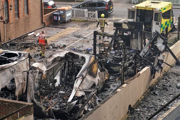 View at burnt ambulances in a car park at Golders Green in London, Monday, March 23, 2026 after an apparent arson attack on four vehicles belonging to a Jewish ambulance service, Hatzola Northwest.(AP ...