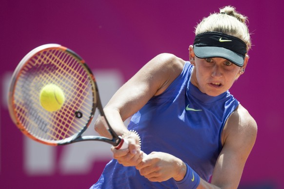 epa06094538 Jil Teichmann of Switzerland in action during her first round match against Tamara Korpatsch of Germany at the WTA Ladies Championship tennis tournament in Gstaad, Switzerland, 18 July 201 ...