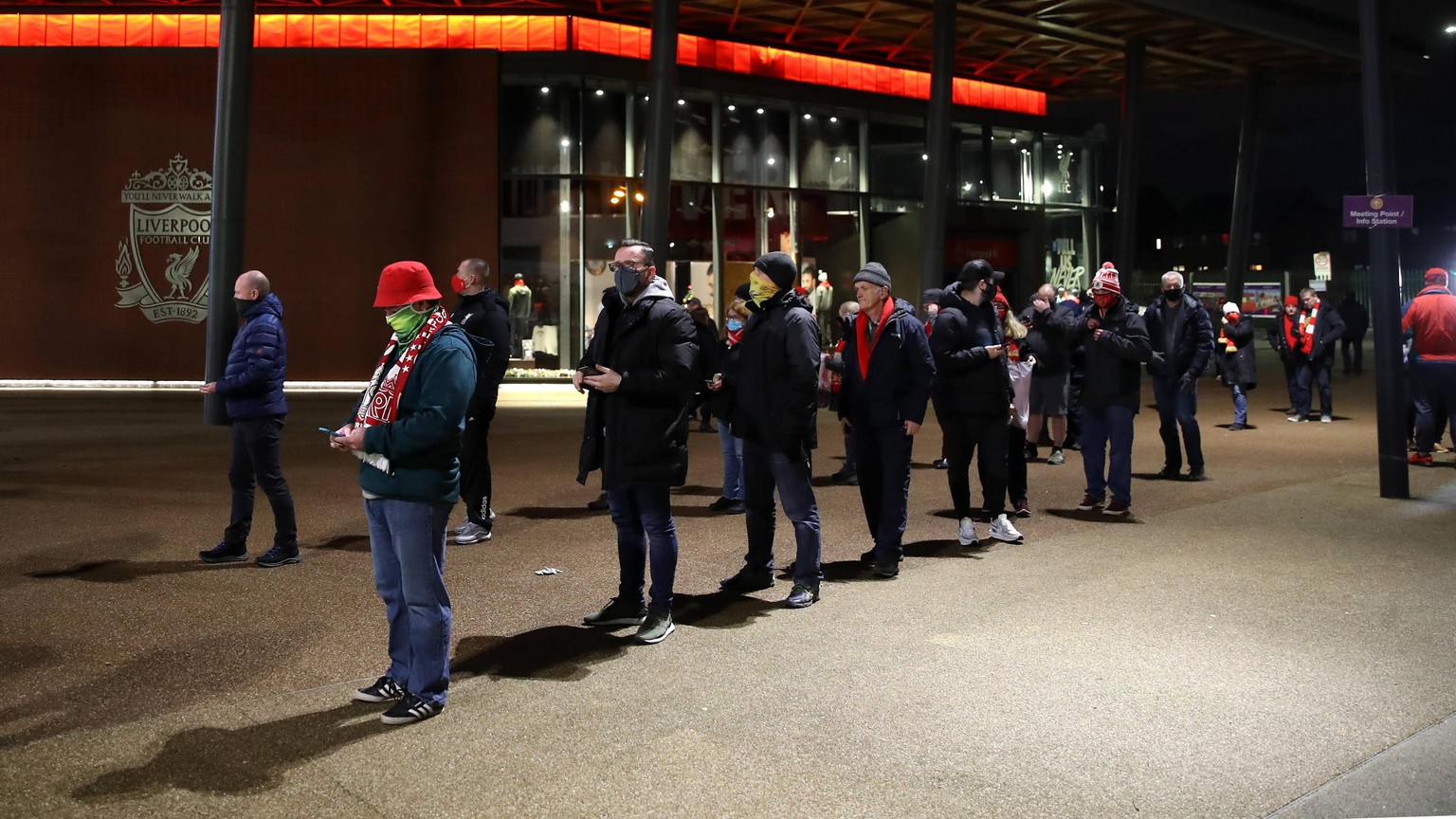 201207 -- LIVERPOOL, Dec. 7, 2020 -- Liverpool s supporters react before the English Premier League match between Liverpool FC and Wolverhampton Wanderers FC in Liverpool, Britain, on Dec. 6, 2020. FO ...