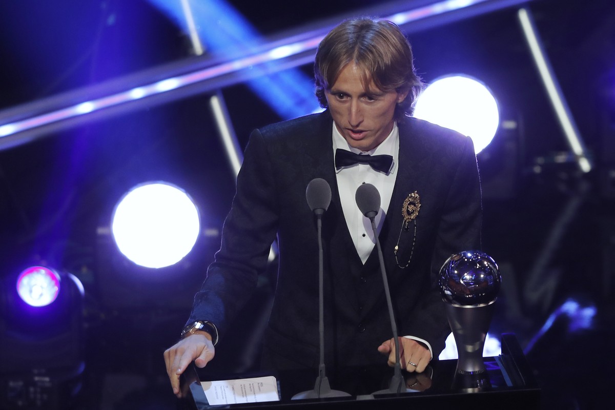 Crotia's Luka Modric receives the Best FIFA Men's Player award during the ceremony of the Best FIFA Football Awards in the Royal Festival Hall in London, Britain, Monday, Sept. 24, 2018. (AP ...