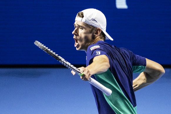 Alex De Minaur of Australia reacts during the semifinal match against Reilly Opelka of the United States at the Swiss Indoors tennis tournament at the St. Jakobshalle in Basel, Switzerland, on Saturda ...