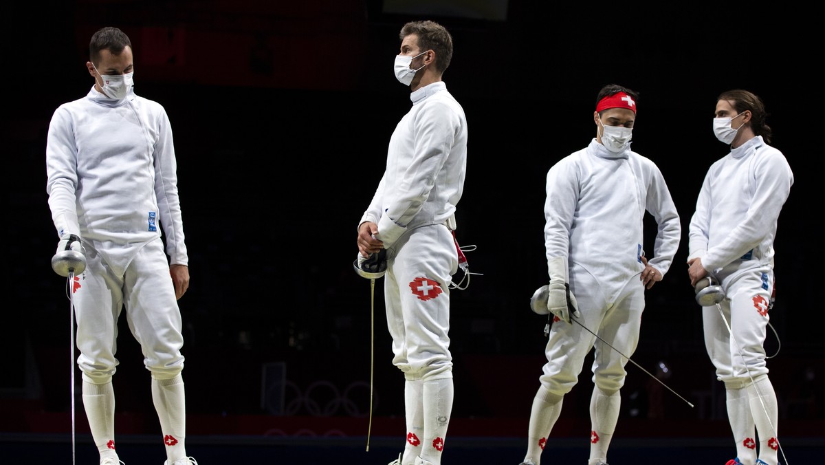 epa09378824 (L-R) - Lucas Malcotti, Benjamin Steffen, Max Heinzer and Michele Niggeler of Switzerland, from left, prior to the men's epee team classifications 5-8 match between Switzerland and Fr ...