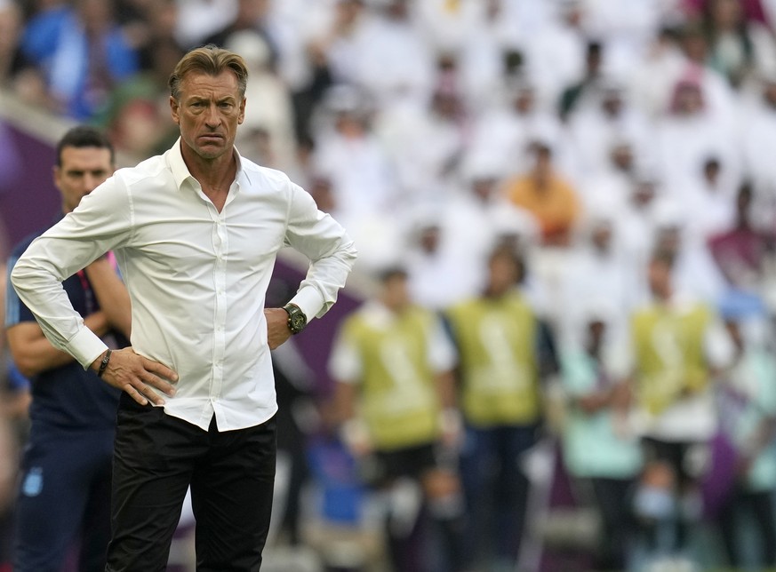 Saudi Arabia&#039;s head coach Herve Renard looks out during the World Cup group C soccer match between Argentina and Saudi Arabia at the Lusail Stadium in Lusail, Qatar, Tuesday, Nov. 22, 2022. (AP P ...