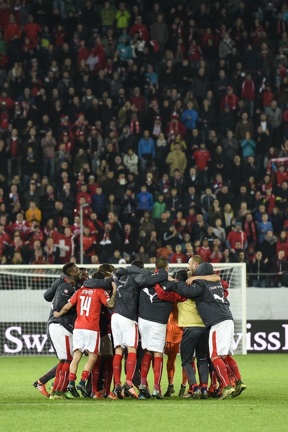 Switzerland cheers after qualifying for the UEFA EURO 2016 qualifying group E soccer match Switzerland against San Marino, at the AFG Stadium in St. Gallen, Switzerland, on Friday, October 9, 2015. (K ...