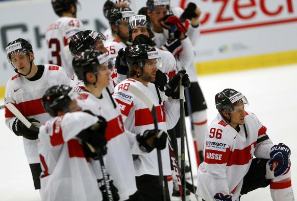 Players of Switzerland react after their Ice Hockey World Championship quarterfinals game against the U.S. at the CEZ arena in Ostrava, Czech Republic May 14, 2015. REUTERS/Laszlo Balogh