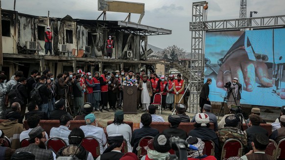 epa12827172 Deputy Minister of the Interior Mohammad Nabi Omari talks with journalists at the scene of alleged Pakistani airstrikes in Kabul, Afghanistan, 17 March 2026. Afghan authorities alleged tha ...