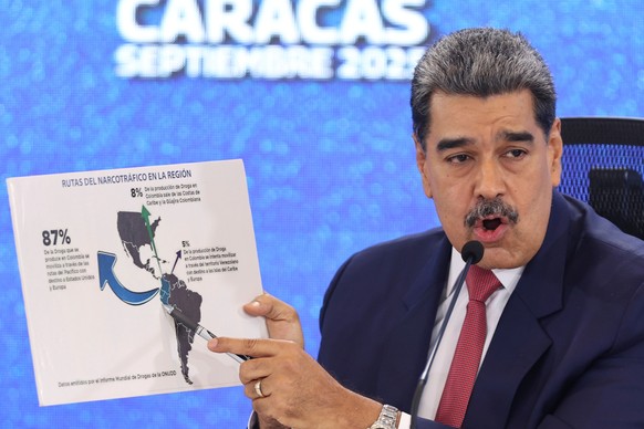 FILE - Venezuela&#039;s President Nicolas Maduro points at a map of the Americas during a new conference in Caracas, Venezuela, Sept 15, 2025. (AP Photo/Jesus Vargas), File
Nicolas Maduro
