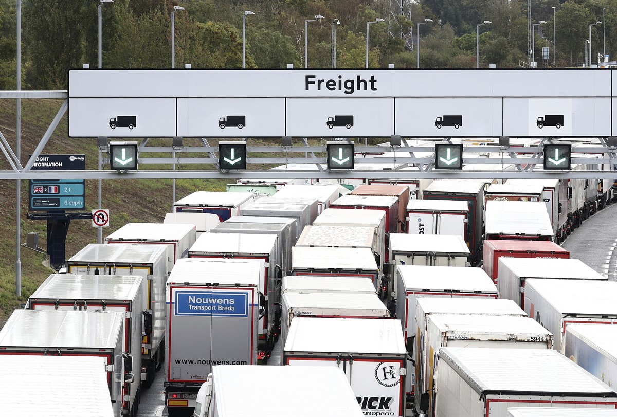 A view of lorries queuing for the Eurotunnel in Folkestone, Kent, England, Friday, Sept. 25, 2020, as the government develops the 27-acre site near Ashford into a post-Brexit lorry park as it gears up ...