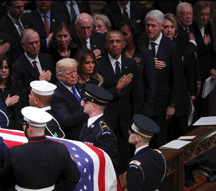 epa07210663 United States President Donald J. Trump (L), First Lady Melania Trump (2L), along with Former United States President Barack Obama (3L), Former First Lady Michelle Obama (4L), Former Unite ...