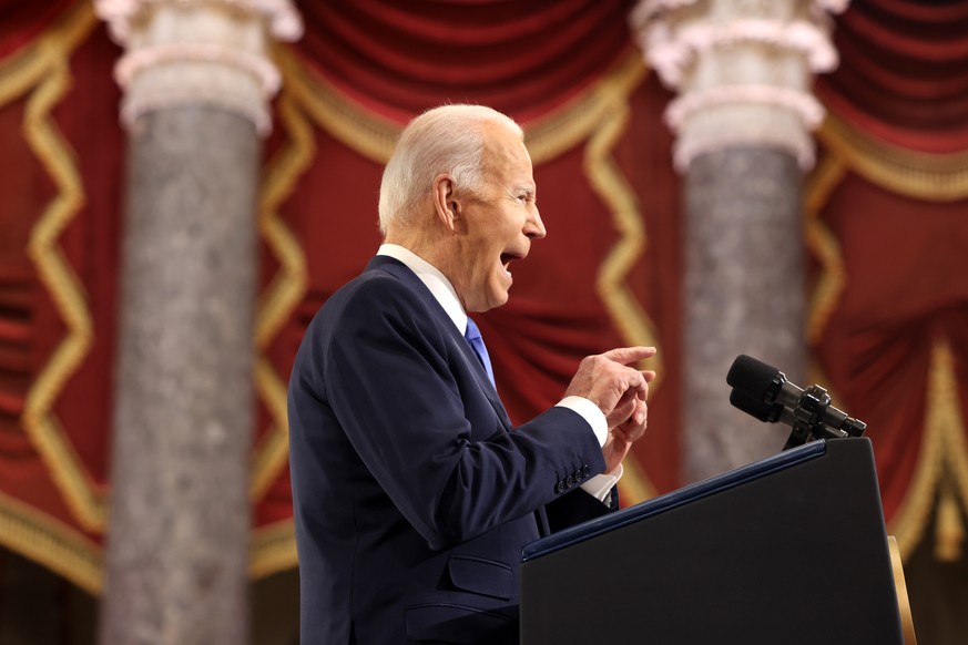 epa09670005 US President Joe Biden delivers remarks on the one-year anniversary of the January 6th insurrection at the Statuary Hall of the US Capitol in Washington, DC, USA, 06 January 2022. On 06 Ja ...