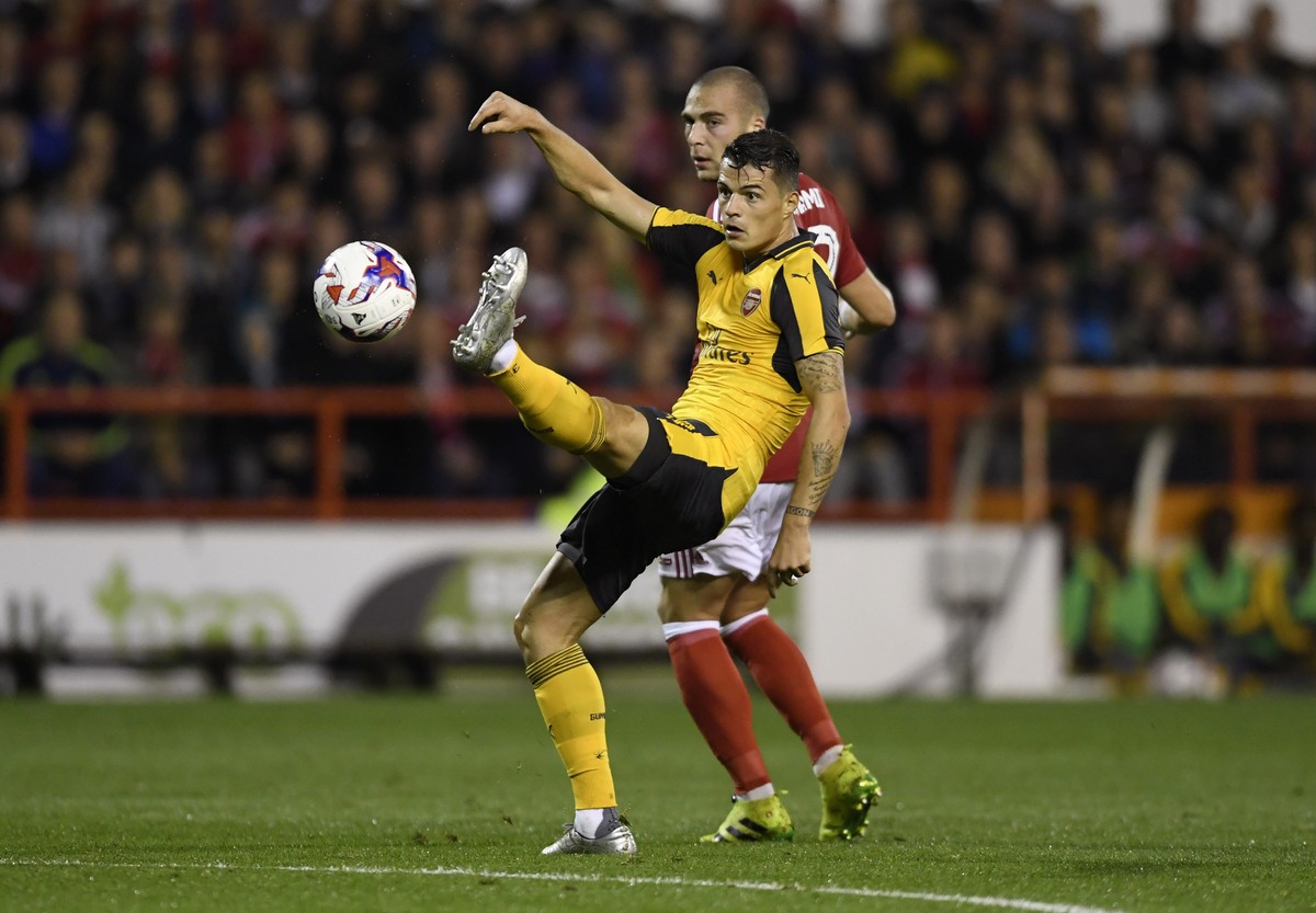 Britain Football Soccer - Nottingham Forest v Arsenal - EFL Cup Third Round - The City Ground - 20/9/16
Arsenal's Granit Xhaka in action with Nottingham Forest's Patjim Kasami 
Action Imag ...