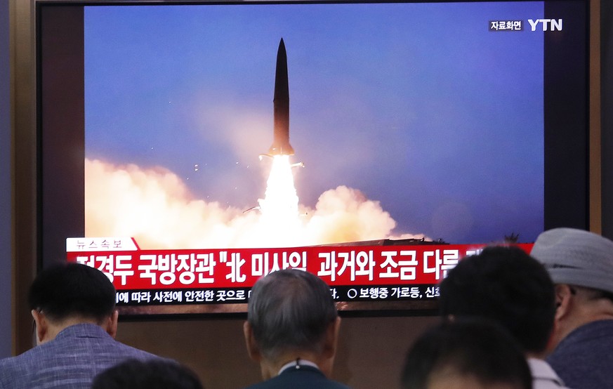 People watch a TV showing a file image of North Korea&#039;s missile launch during a news program at the Seoul Railway Station in Seoul, South Korea, Wednesday, July 31, 2019. North Korea on Wednesday ...