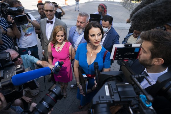 Sarah Ransome, right, an alleged victim of Jeffrey Epstein and Ghislaine Maxwell, alongside Elizabeth Stein, left, speak to members of the media outside federal court, Tuesday, June 28, 2022, in New Y ...