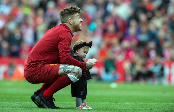 epa05979479 Liverpool’s Alberto Moreno reacts with the crowd during a walk around the pitch after the English Premier League soccer match between Liverpool and Middlesbrough held at the Anfield in Liv ...