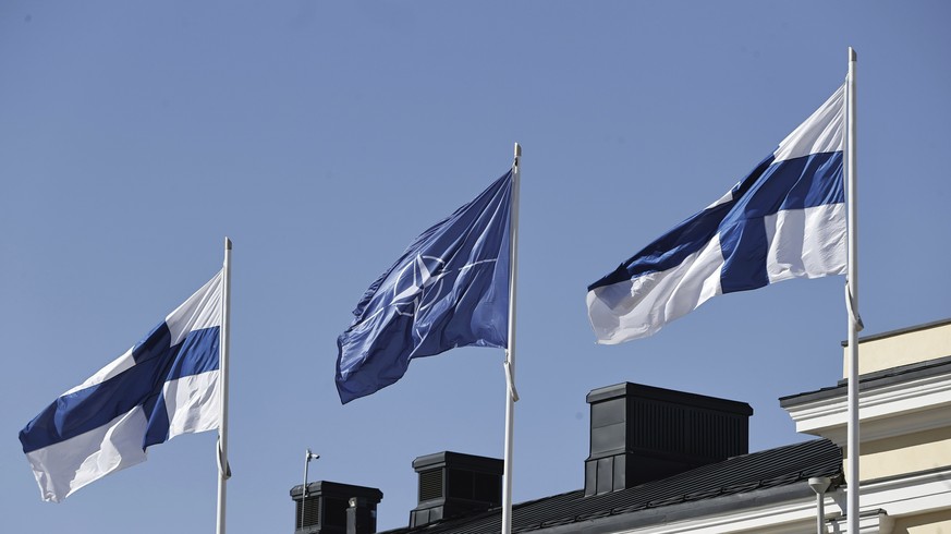Finnish and Nato flags flutter at the courtyard of the Foreign Ministry in Helsinki, Finland, Tuesday, April 4, 2023. Finland is poised to join NATO in a historic realignment brought on by Russia?s in ...