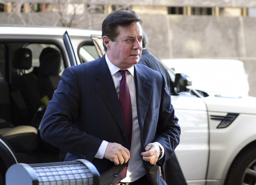 FILE - In this Dec. 11, 2017, file photo, former Trump campaign chairman Paul Manafort arrives at federal court in Washington. In a dramatic escalation of pressure and stakes, special counsel Robert M ...