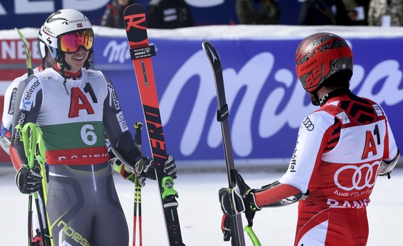 Norway&#039;s Henrik Kristoffersen, left, smiles to second placed Austria&#039;s Marcel Hirscher after winning a men&#039;s World Cup giant-slalom, in Bansko, Bulgaria, Sunday, Feb. 24, 2019. (AP Phot ...