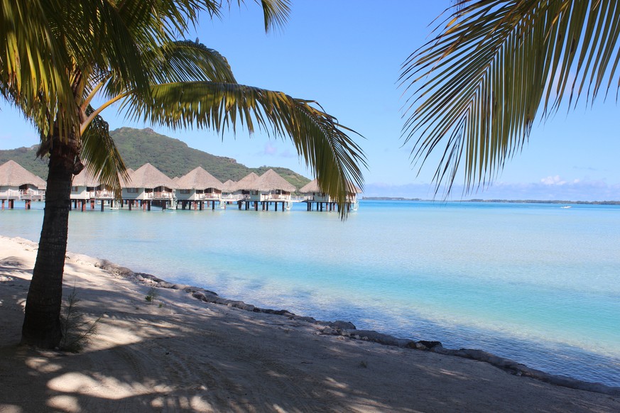 This Oct. 30, 2016 photo shows a view of the beach, lagoon and bungalows at Le Meridien resort in Bora Bora. Bora Bora offers celebrity-style seclusion and has been a vacation destination for the like ...