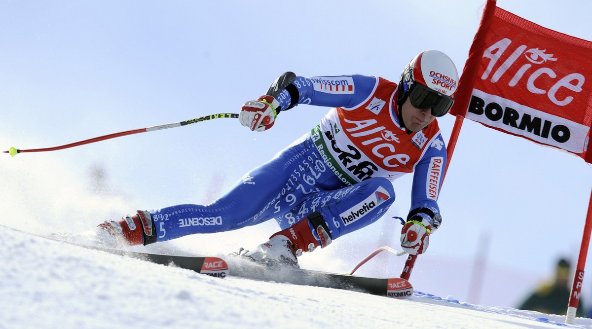 Daniel Albrecht, of Switzerland, speeds down the course during a men's super-G, at the alpine ski, World Cup finals, in Bormio, Italy, Thursday, March 13, 2008. (AP Photo/Marco Trovati)