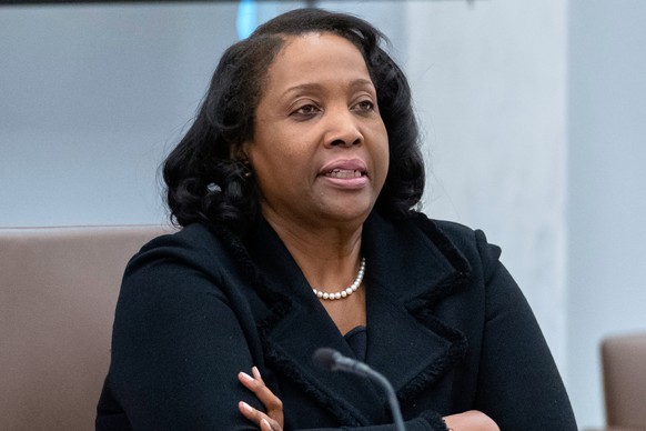 FILE - Federal Reserve Board of Governors member Lisa Cook listens during an open meeting of the Board of Governors at the Federal Reserve, June 25, 2025, in Washington. (AP Photo/Mark Schiefelbein, F ...