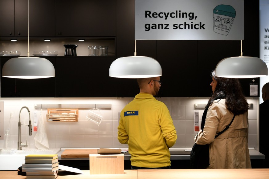 epa06260695 A customer in newly opened IKEA store in Kaarst, Germany, 12 October 2017. After a construction phase of one and a half years the world&#039;s most sustainable store of the Swedish home fu ...