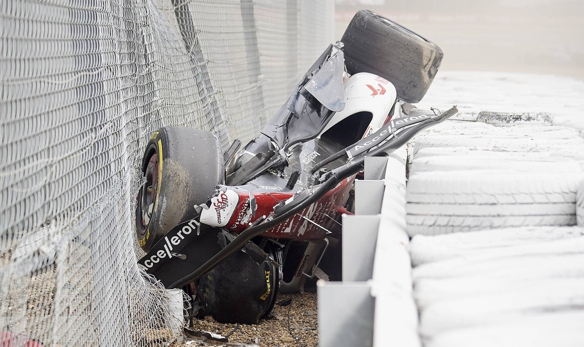 F1 Grand Prix of Great Britain Zhou Guanyu of China and Alfa Romeo F1 is assisted by the assistances during the race of the F1 Grand Prix of Great Britain at Silverstone on July 3, 2022 in Northampton ...