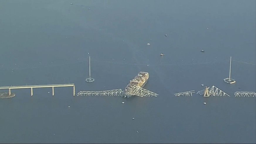 Parts of the Francis Scott Key Bridge remain after a container ship collided with one of the bridge&#039;s supports Tuesday, March 26, 2024 in Baltimore. The major bridge in Baltimore snapped and coll ...