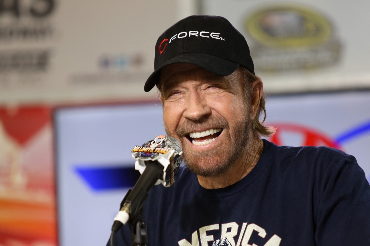 (FILES) Actor Chuck Norris(L) currently the star of the US television show "Walker, Texas Ranger" works the crowd to campaign for US Republican Presidential candidate Texas Governor George W ...