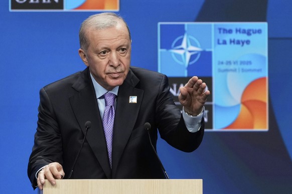 FILE - Turkish President Recep Tayyip Erdogan gestures during a press conference after the plenary session at the NATO summit in The Hague, Netherlands, on June 25, 2025. (AP Photo/Markus Schreiber, F ...