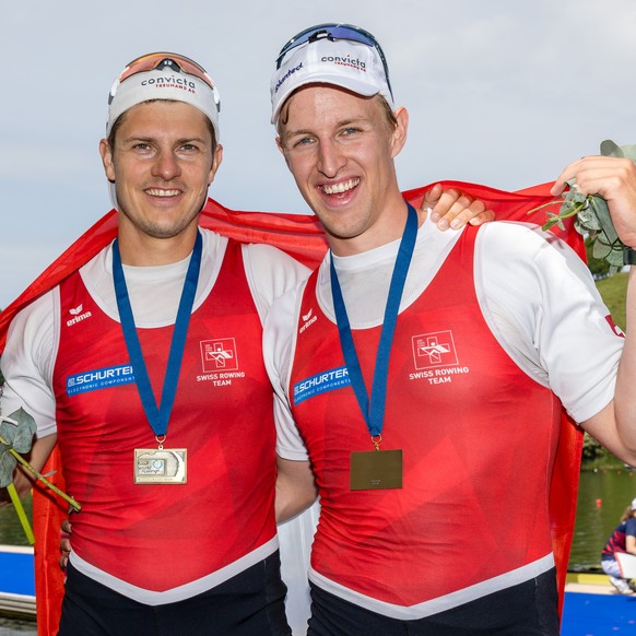 Bronze medalists Roman Roeoesli, left, and Andrin Gulich of Switzerland celebrate the third place in the Men&#039;s Pair Final A on the third day of the 2024 World Rowing Cup at Rotsee on Sunday, May  ...