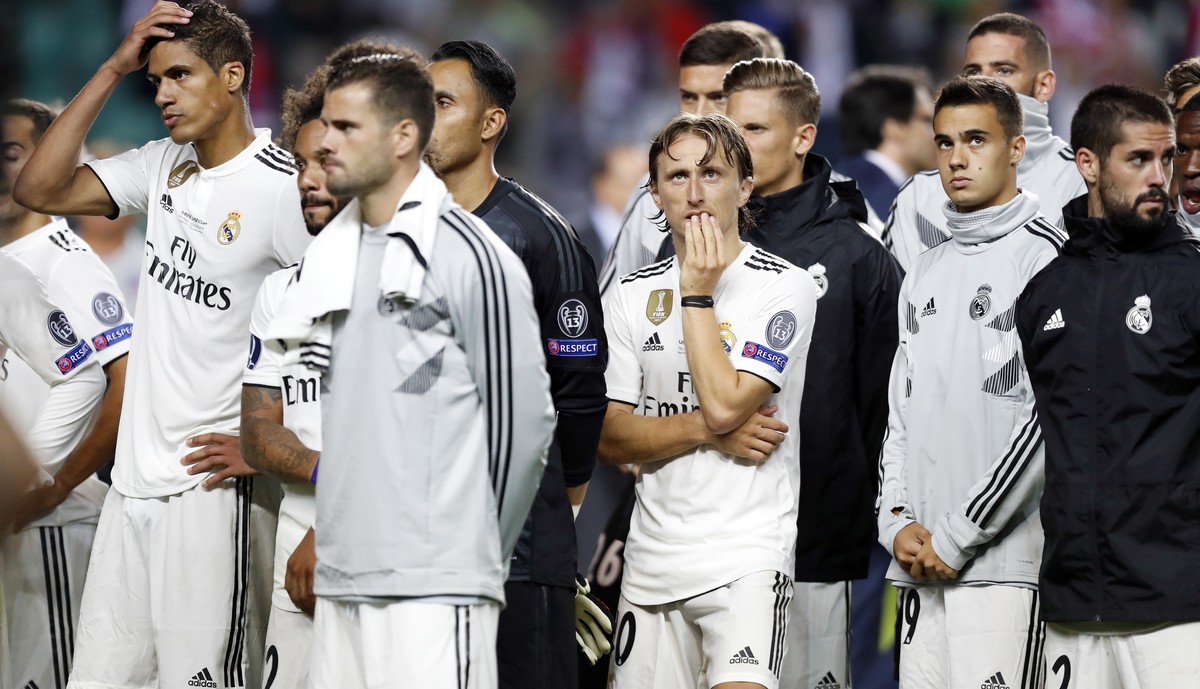 Real Madrid's team players reacts after they loose the UEFA Super Cup final soccer match between Real Madrid and Atletico Madrid at the Lillekula stadium in Tallinn, Estonia, Wednesday, Aug. 15,  ...