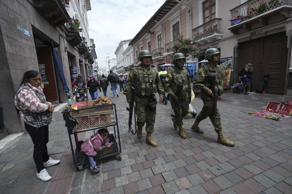 Soldiers patrol near the government palace during a state of emergency in Quito, Ecuador, Tuesday, Jan. 9, 2024. The country has seen a series of attacks after the government imposed a state of emerge ...