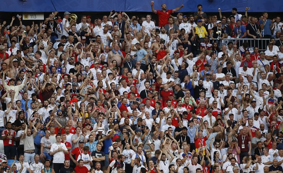 England fans celebrate during the quarterfinal match between Sweden and England at the 2018 soccer World Cup in the Samara Arena, in Samara, Russia, Saturday, July 7, 2018. (AP Photo/Francisco Seco)