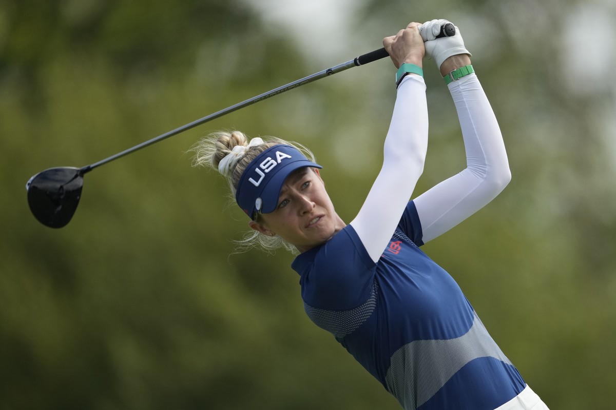 Nelly Korda, of the United States, hits her shot from the 14th tee during the third round of the women's golf event at the 2024 Summer Olympics, Friday, Aug. 9, 2024, at Le Golf National, in Sain ...