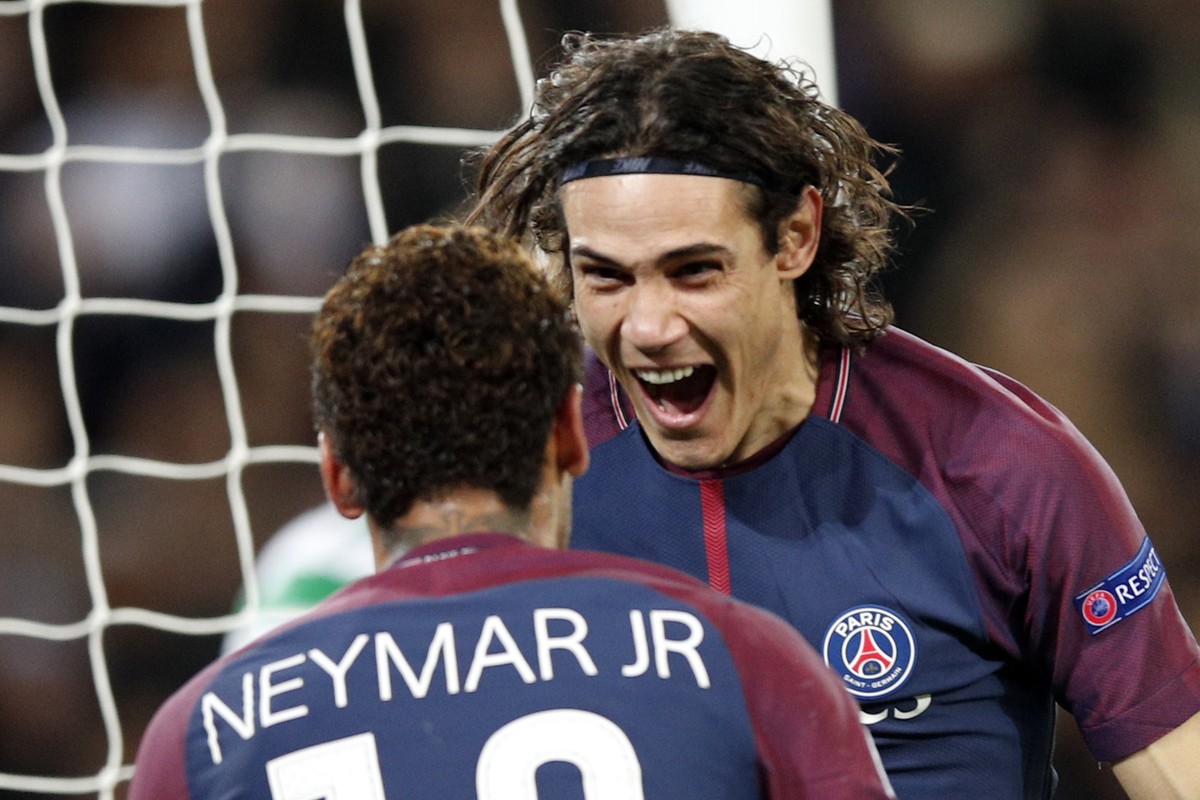 PSG's Edinson Cavani, right, celebrates after scoring his side's third goal with his teammate Neymar during a Champions League Group B soccer match between Paris St. Germain and Celtic at th ...