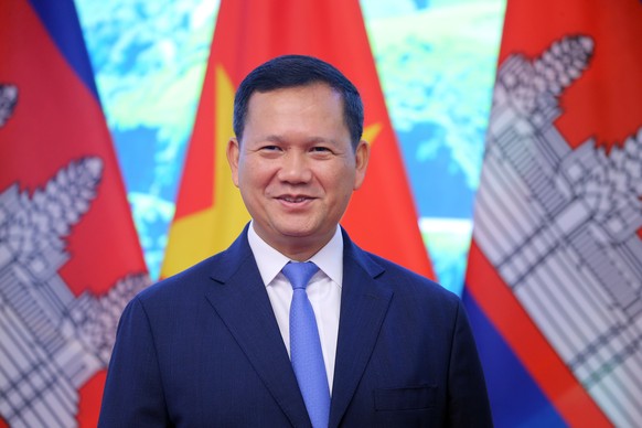 epa11022389 Cambodian Prime Minister Hun Manet poses for a photo at the Government Office in Hanoi, Vietnam, 11 December 2023. Hun Manet is on an official visit to Vietnam from 11 to 12 December 2023. ...