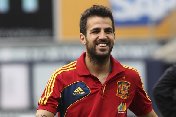 FILE - Spain forward Cesc Fabregas is seen on the field before the start of an exhibition international friendly soccer match against Ireland, June 11, 2013, at Yankee Stadium in New York. Former Barc ...