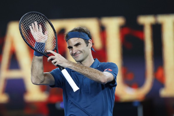 epa07295013 Roger Federer of Switzerland celebrates defeating Taylor Fritz of the USA during their round three men&#039;s singles match at the Australian Open Grand Slam tennis tournament in Melbourne ...