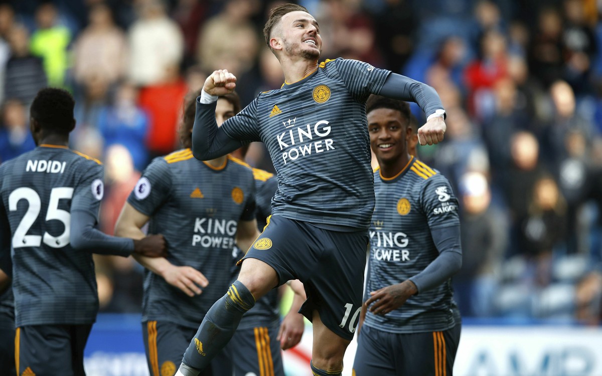 Leicester City's James Maddison celebrates scoring against Huddersfield Town during the English Premier League soccer match at the John Smith's Stadium, Huddersfield, England, Saturday April ...