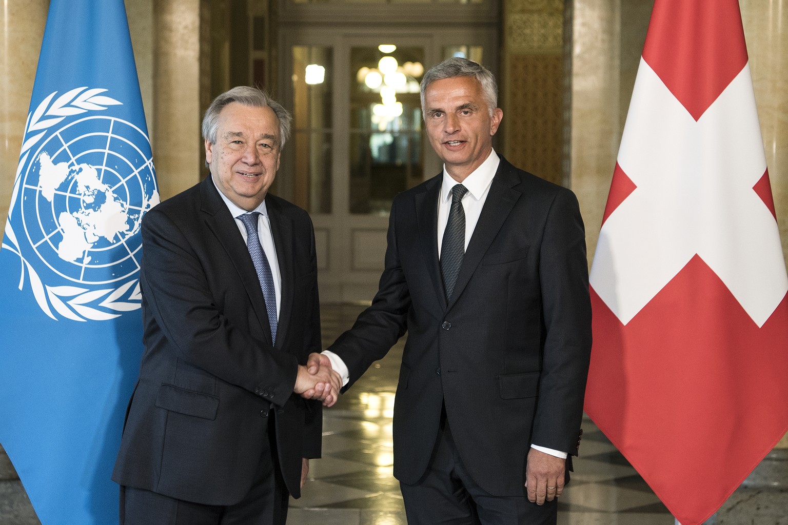 Swiss Federal Councillor and Foreign minister Didier Burkhalter, right, welcomes Antonio Guterres, Secretary-General of the United Nations, left, in the federal parliament building, Monday, 24 April 2 ...