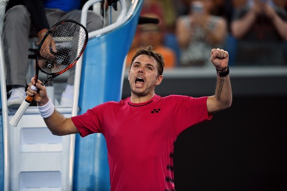 epa05721497 Stan Wawrinka of Switzerland celebrates his match win against Martin Klizan of Slovakia during their Men&#039;s Singles first round match of the Australian Open Grand Slam tennis tournamen ...