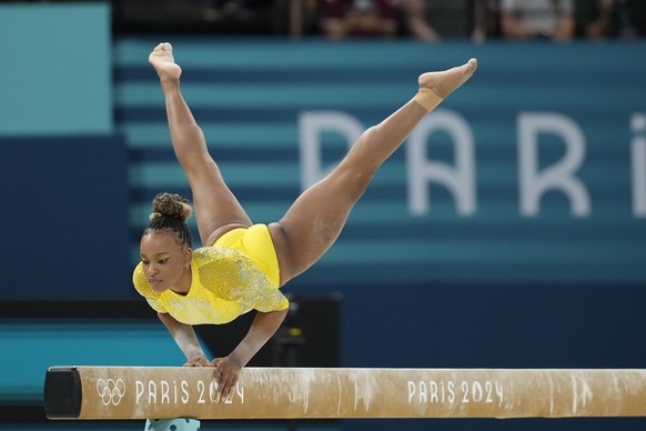 Rebeca Andrade, of Brazil, performs on the balance beam during the women&#039;s artistic gymnastics all-around finals in Bercy Arena at the 2024 Summer Olympics, Thursday, Aug. 1, 2024, in Paris, Fran ...